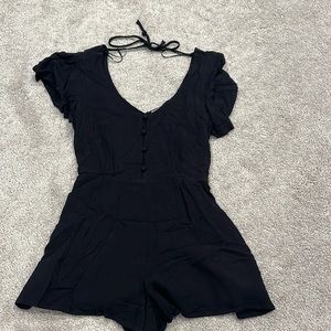 Francesca’s black romper